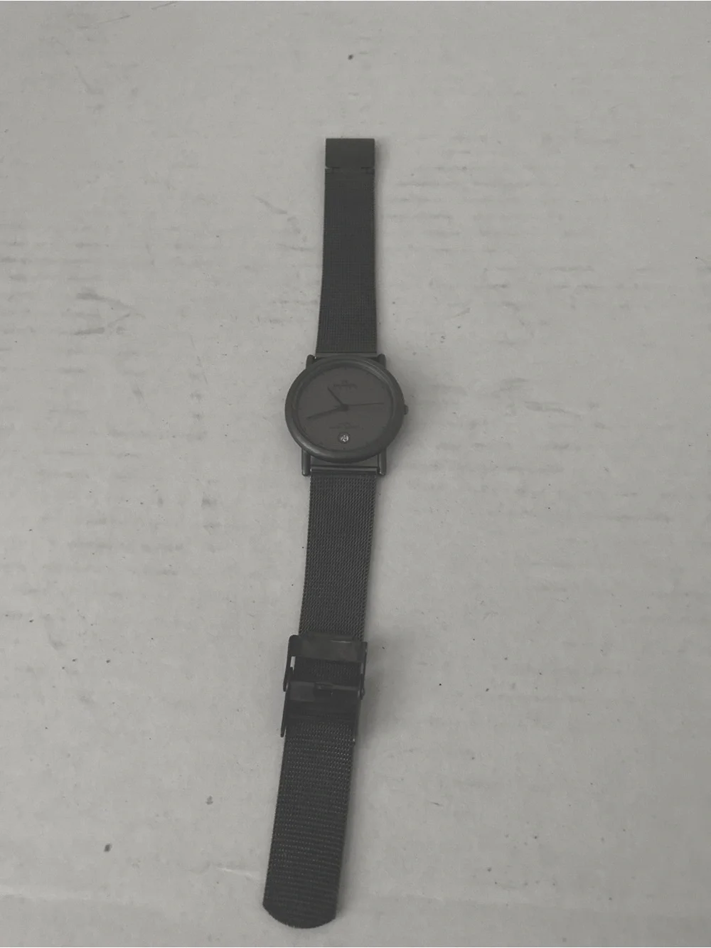 Skagen Unisex Minimalist Gunmetal Case/Mesh Band Watch. Calendar and a 2nd Hand.